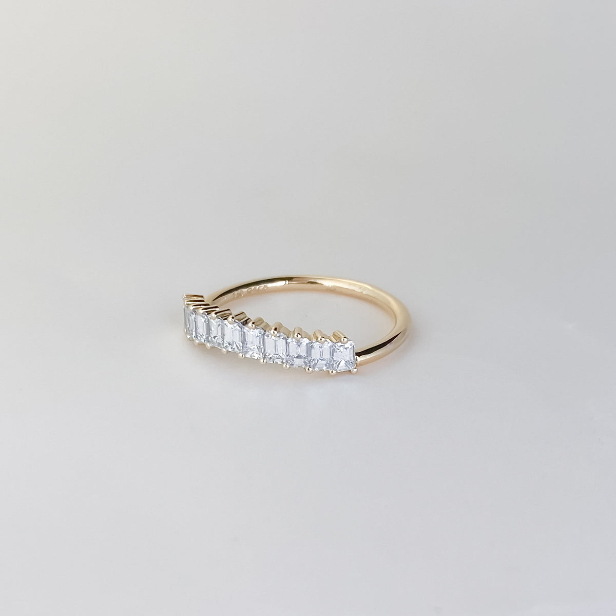 0.68 TCW Emerald Curved Lab Grown Diamond Wedding Band