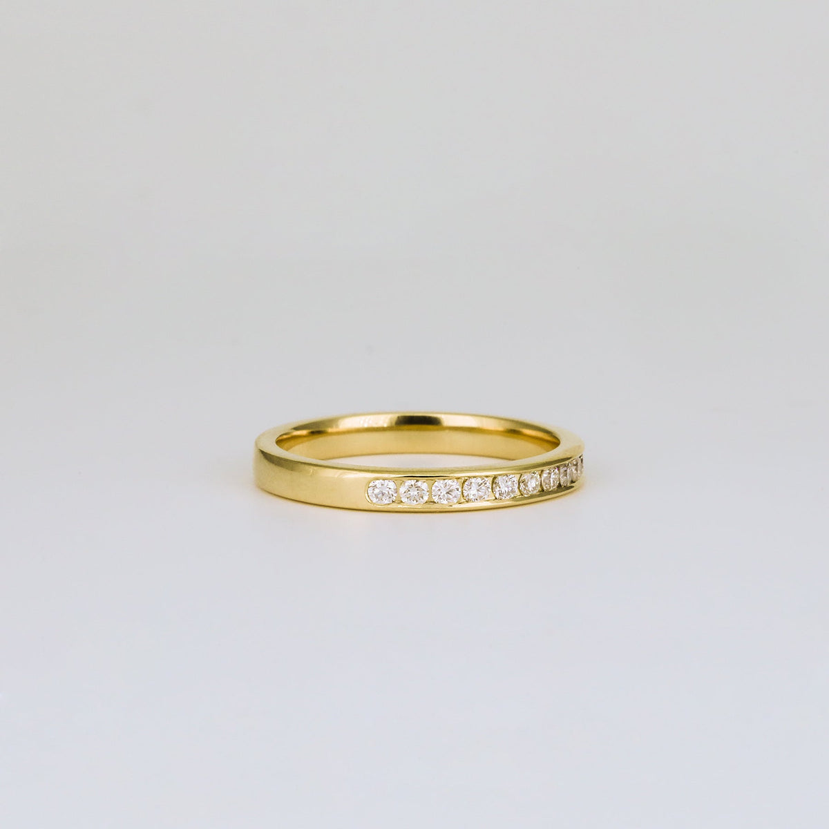 0.32 TCW Round Channel Setting Lab Grown Diamond Wedding Band