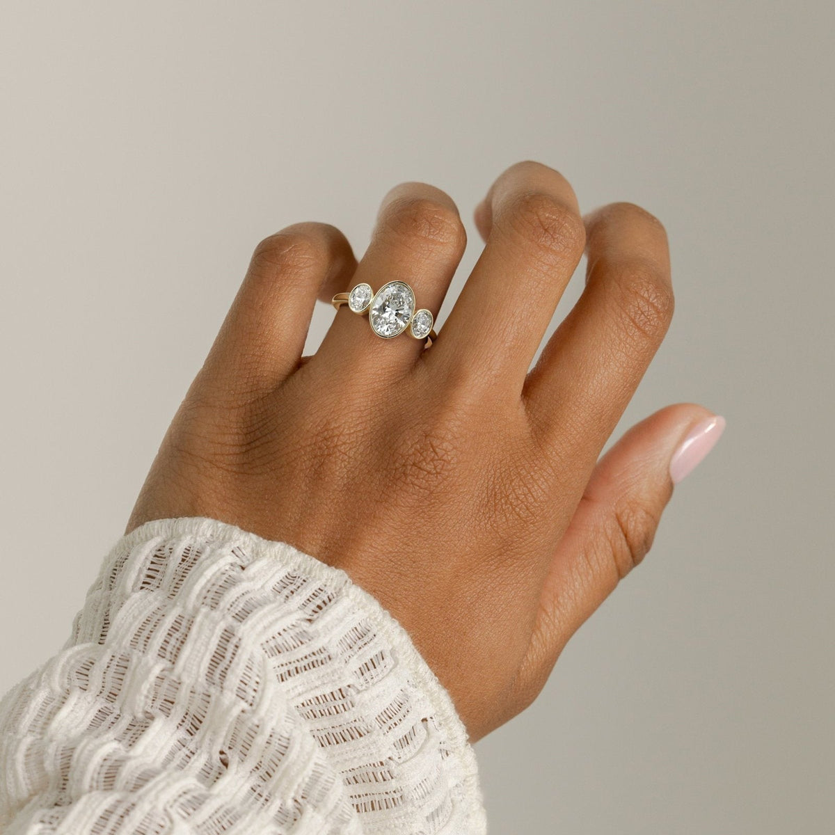 Oval Three Stone Bezel Lab Grown Diamond Engagement Ring