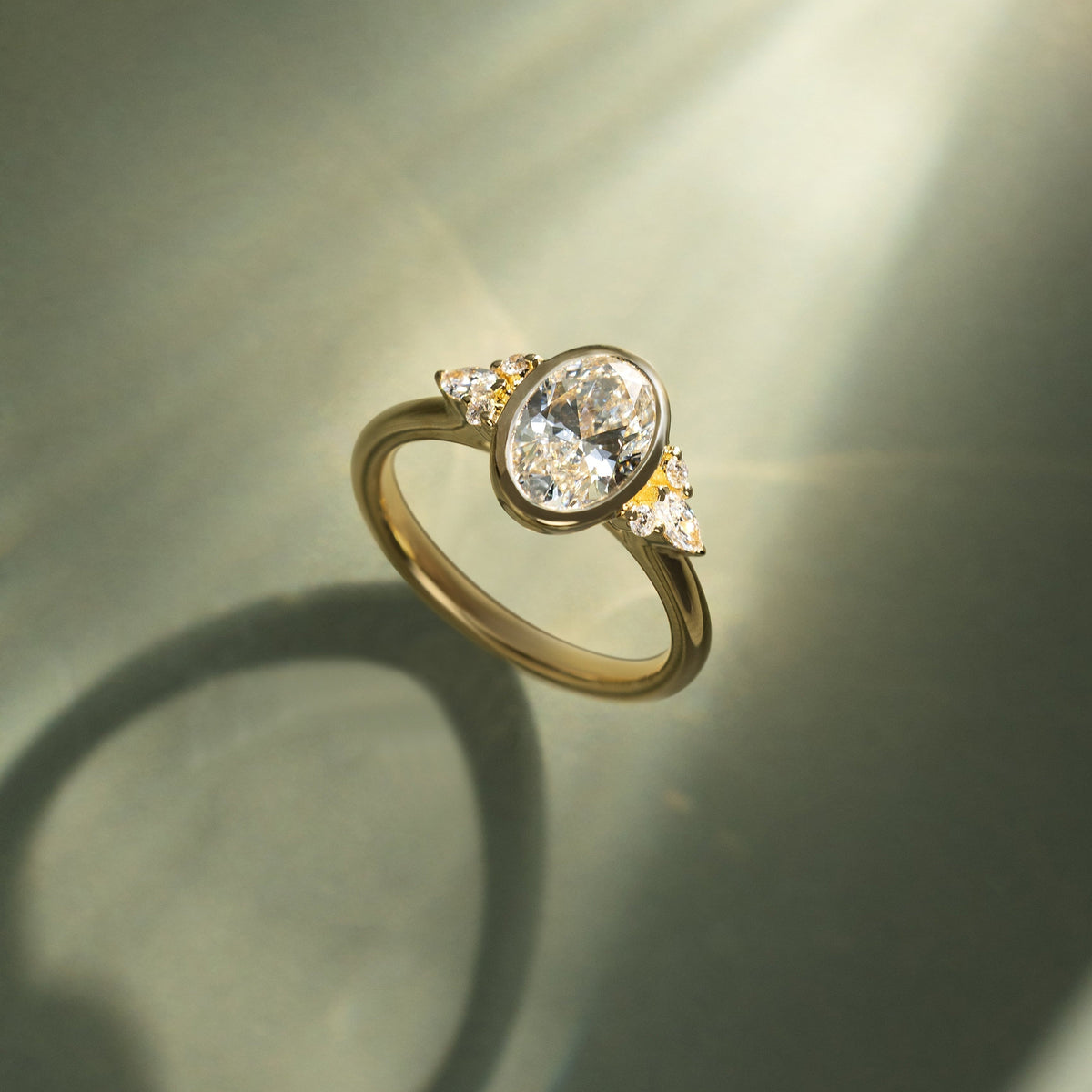 Oval Cluster Bezel Lab Grown Diamond Engagement Ring