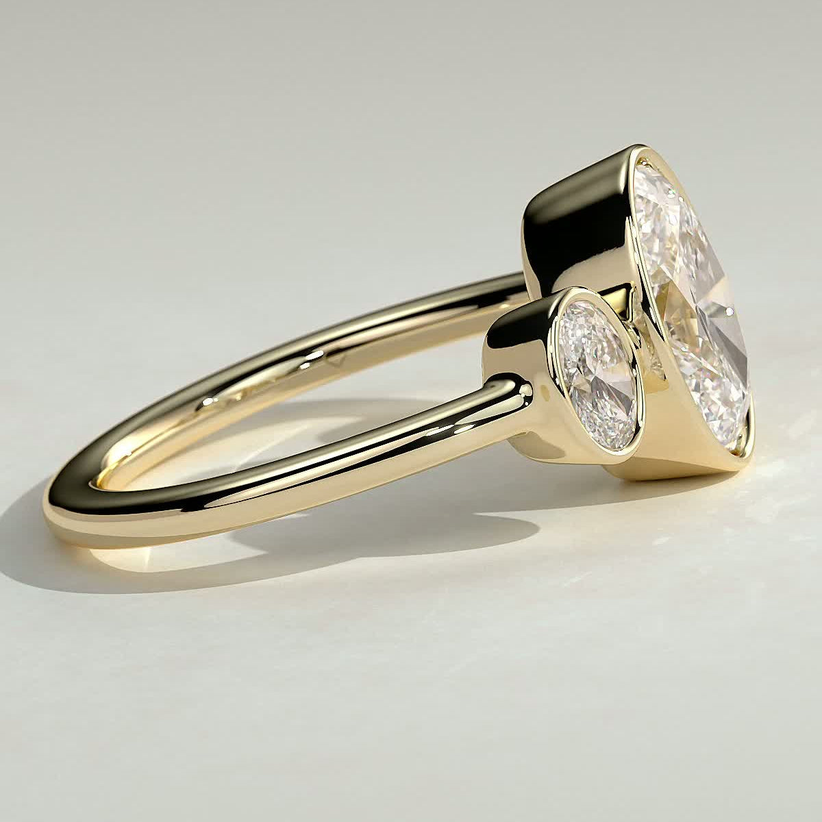 Oval Three Stone Bezel Lab Grown Diamond Engagement Ring