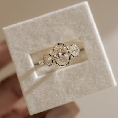 Oval Three Stone Bezel Lab Grown Diamond Engagement Ring
