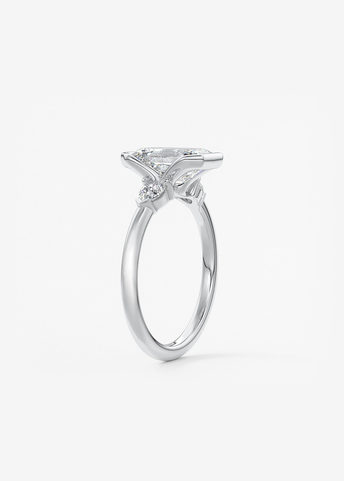 Emerald Three Stone Bezel Lab Grown Diamond Engagement Ring