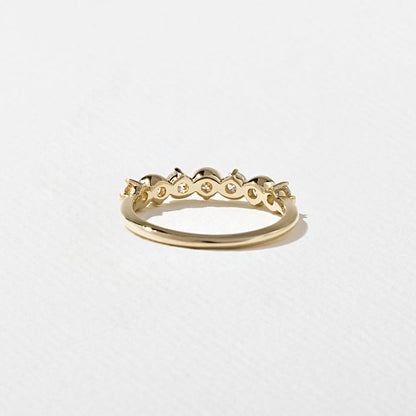 0.57 TCW Round Bezel Lab Grown Diamond Wedding Band