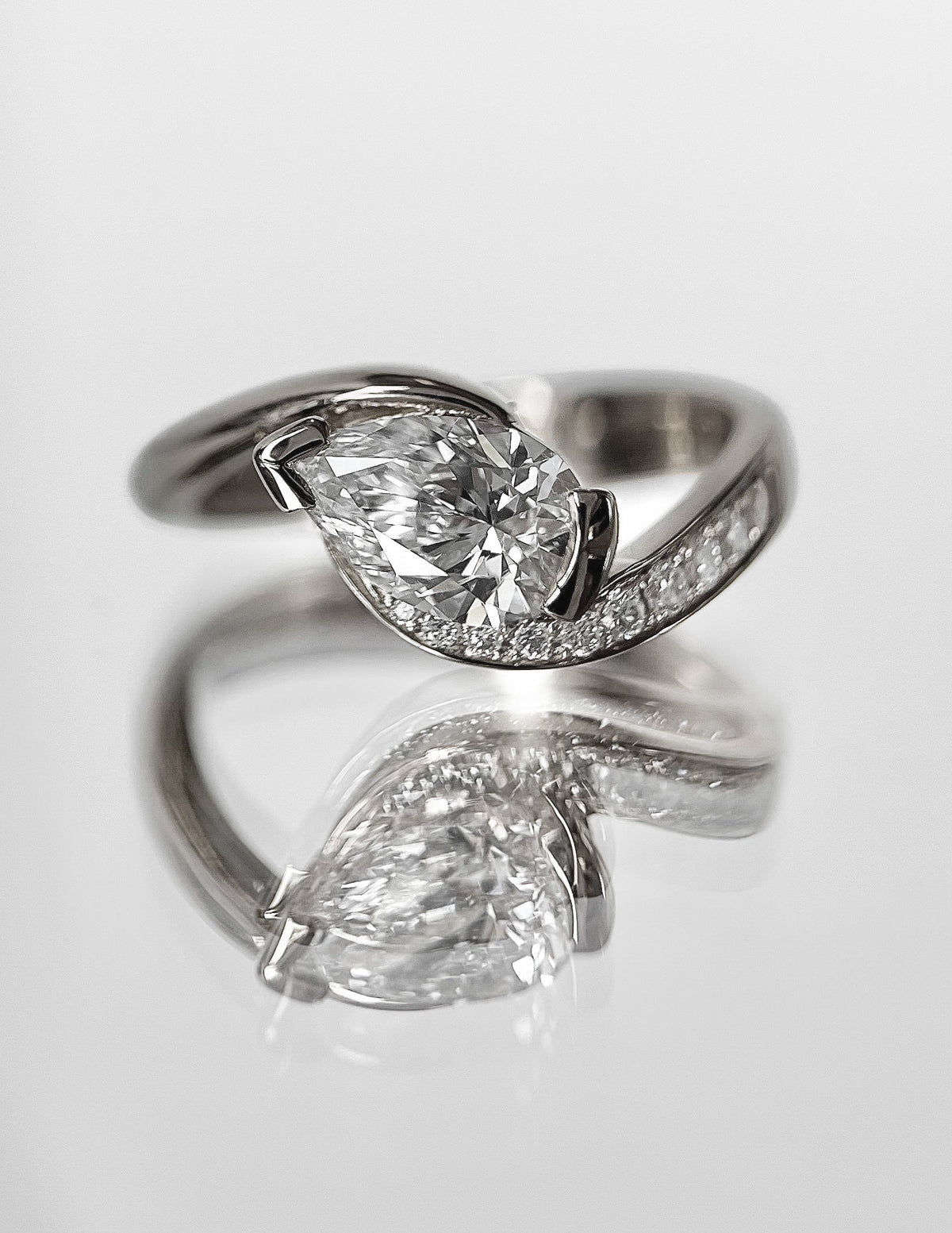 1.5 CT Pear Cut Lab Grown Diamond Pavé Unique Setting Engagement Ring
