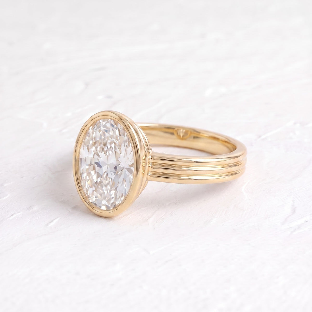 Phoebe Dynevor – Inspired Oval Cut Bezel Lab Grown Diamond Engagement Ring