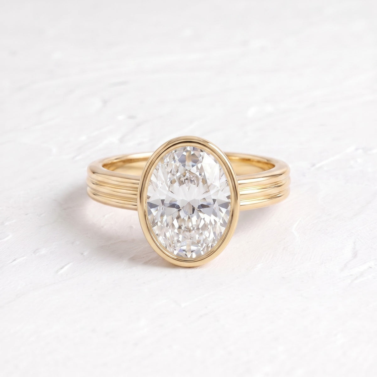 Phoebe Dynevor – Inspired Oval Cut Bezel Lab Grown Diamond Engagement Ring