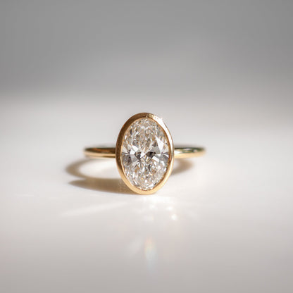 1.5 CT Oval Bezel Lab Grown Diamond Engagement Ring